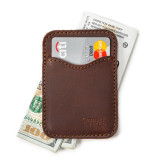High quality red brown leather wallet standing with cash open.