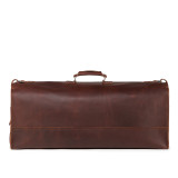 High quality back side of an extra large red leather duffle bag. It is smooth and only shows a handle.