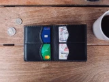High quality lifestyle image of the Silverback Large Bifold leather Wallet in black