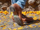 High quality lifestyle image of the Huntsman boot in natural patina