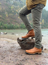 High quality view of the Huntsman boot in natural patina in outdoors
