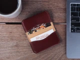 High quality lifestyle image of the slim business card leather holder in Italian reddish brown