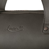 High quality up close look at the logo in carbon black