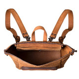 High quality this tan leather woman's backpack is showing the inside view
