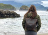High quality this dark brown women's leather backpack is on Suzette's back at the beach.