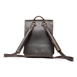High quality this dark brown leather backpack has two shoulder pads on the back.