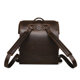 High quality backside of the dark brown leather big mouth backpack. Two shoulder straps to make carrying easier and a loop to hang bag from. Made by Saddleback