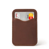 High quality red brown leather wallet standing with no cash.