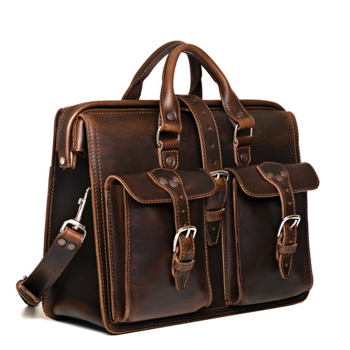 High quality dark brown flight bag leather briefcase at an angle to show the sizing better. Made by Saddleback