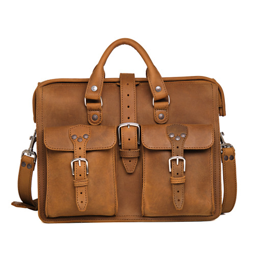 High quality tan flight leather bag briefcase from the front with two handles and a shoulder strap. Made by Saddleback