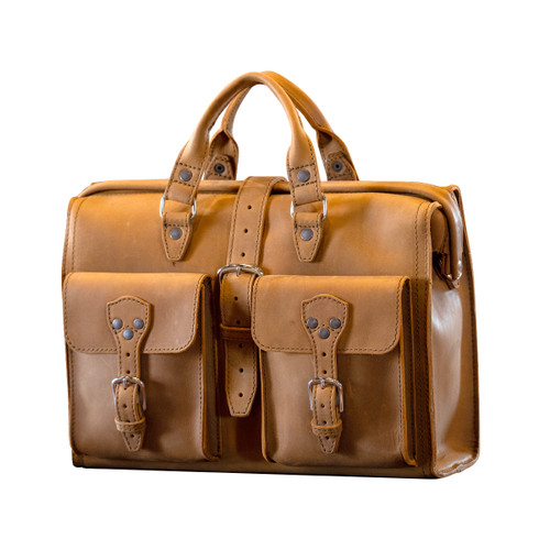 High quality tan flight leather bag briefcase from the front with two handles and a shoulder strap. Made by Saddleback