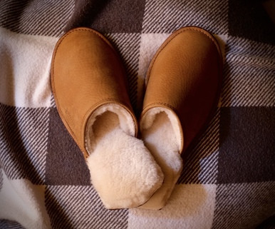 High quality tan full grain leather Dave's Deals Women's Sheepskin Slippers - Old Design - Size 9 - Tobacco front view - Saddleback Leather