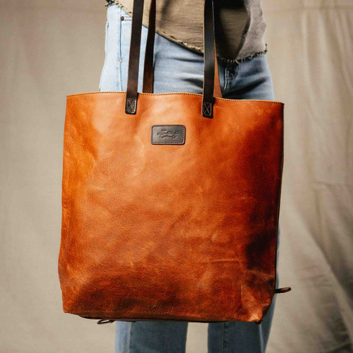 Leather tote for travel by Saddleback.