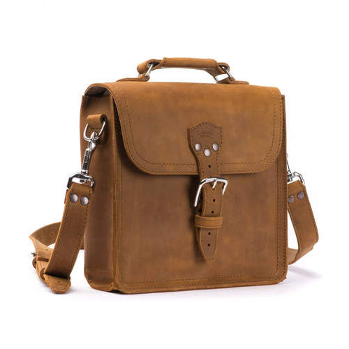 This is a tan brown leather satchel man bag from the side.