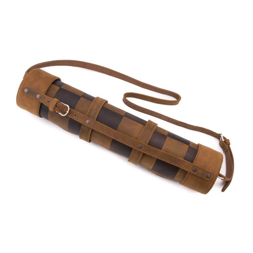 High quality leather travel chess set that is rolled up with a shoulder strap.