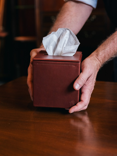 Lifestyle view of premium full grain leather tissue box holder in reddish brown