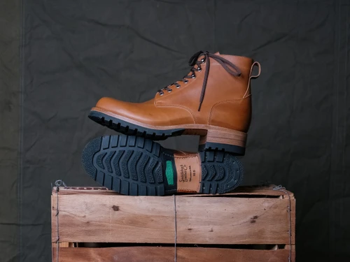High quality side view of the Huntsman boot in natural patina