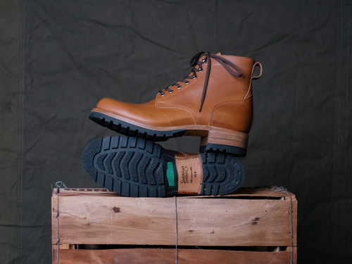 High quality side view of the Huntsman boot in natural patina