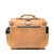 High quality back view  of a tan brown rounded leather satchel.