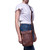 High quality model view of the Crossbody Leather Zipper Pouch in red brown