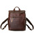 High quality front view of the leather all in one backpack in red brown