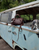 High quality the dark brown leather everyday purse on a vintage car. Made by Saddleback