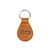 High quality front side of the tan colored leather keychain with the Saddleback logo on it