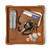 High quality tan colored leather valet tray that is holding a wallet, keys, change, and a pocket knife. Made by Saddleback