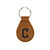 High quality tan colored leather keychain with Cleveland Guardians logo on it, made by Saddleback