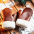 High quality tumbled leather sheepskin mittens in red brown.
