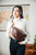 High quality model shot of the dark coffee fanny leather bag across body