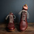 High quality saddleback Leather Oxblood Officer's Boot with tan laces.