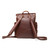 This is a red brown leather backpack back side with comfortable straps.