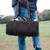 High quality lifestyle model image of our range and tool leather tote in dark brown