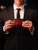 High quality lifestyle view of the Newton leather wallet in reddish brown