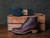 High quality side view of the Huntsman boot in dark brown