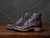 This is the side view of the Huntsman boot in dark brown