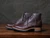 High quality side view of the Huntsman boot in dark brown