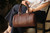 High quality lifestyle image of the everyday barrel leather purse