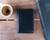 High quality lifestyle image of the passport leather sleeve in black