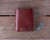 High quality lifestyle image of the Silverback Large Bifold leather Wallet in reddish brown