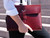 This is the lifestyle image of the document holder in reddish brown
