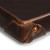 High quality this leather catchall valet tray can hold a lot because the corner of this dark brown one is so strong.