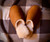 High quality tan full grain leather Dave's Deals Women's Sheepskin Slippers - Old Design - Size 12 - Tobacco back view - Saddleback Leather