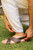 This is a lifestyle image  of the Jesus sandles