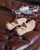 High quality wooden shoe trees on leather ottoman with shoe measuring device - Saddleback Leather
