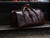 High quality lifestyle view of the leather range and tool bag