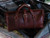 High quality lifestyle view of the leather range and tool bag