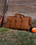 High quality lifestyle view of the leather range and tool bag