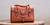 High quality lifestyle image of the silverback handle leather purse